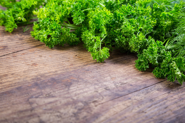 Parsley and dill on wooden table - Foto, imagen