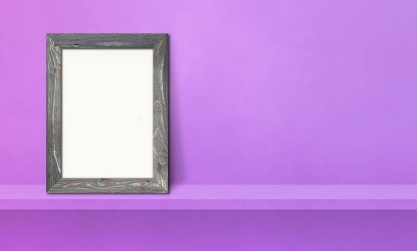 Wooden picture frame leaning on a purple shelf. 3d illustration. Blank mockup template. Horizontal banner - Foto, imagen