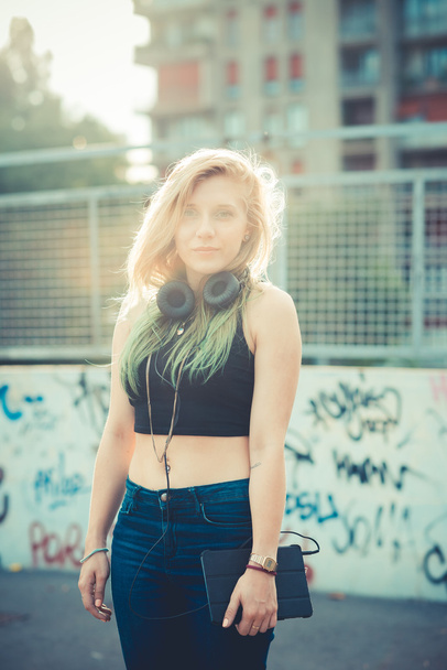 beautiful young blonde hair woman hipster listening music - Fotó, kép