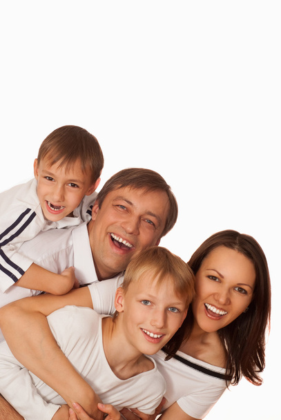 Beautiful happy family of four - Foto, Imagem