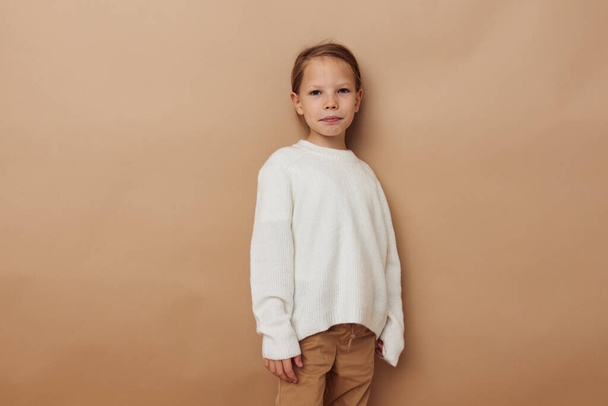 little girl childrens style emotions fun beige background - Фото, изображение