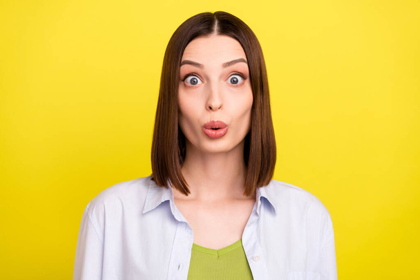 Photo of funky brunette young lady look camera wear blue shirt isolated on yellow color background - Φωτογραφία, εικόνα