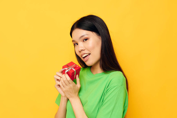 Portrait Asian beautiful young woman Red gift box happy Birthday isolated background unaltered - Fotó, kép
