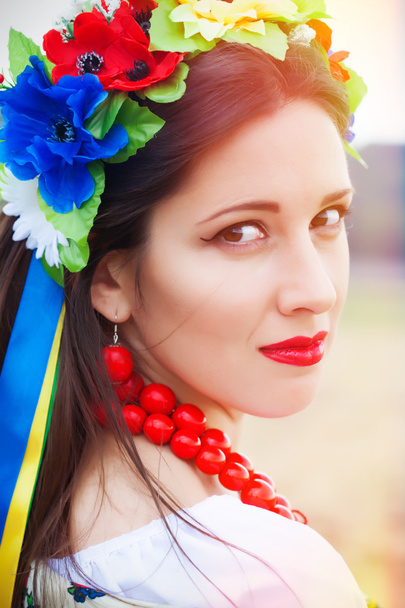 Woman wearing national ukrainian clothes - Fotó, kép