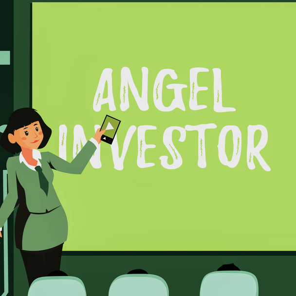 Conceptual display Angel Investor. Word for high net worth individual who provides financial backing Woman Holding Remote Control Presenting Newest Ideas On Backdrop Screen. - Photo, Image
