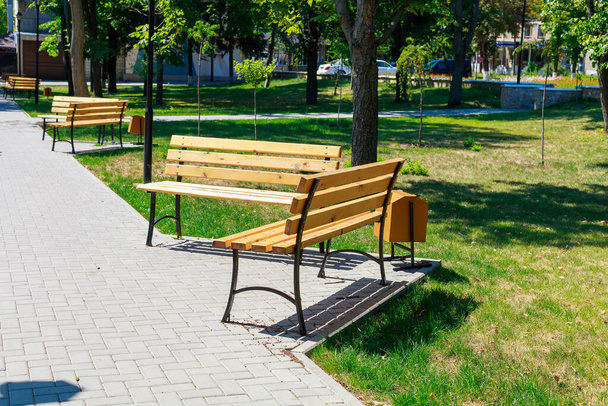 Benches as an element of urban architecture in public places of the city. Background with copy space for text or inscriptions. - Photo, Image