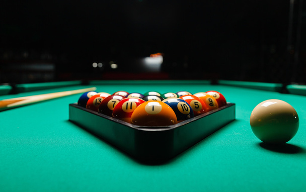 Billiard balls in a pool table. - 写真・画像