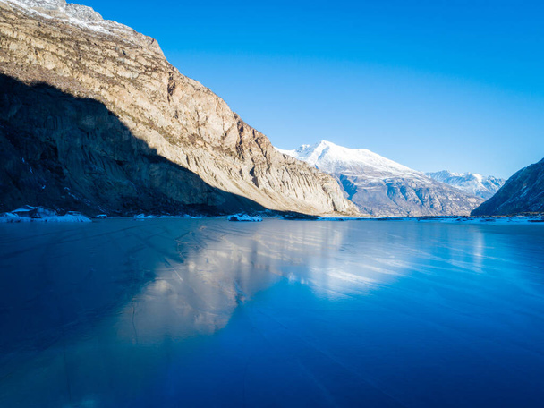 Aerial view of beautiful frozen glacier lagoon in Tibet,China - Foto, Imagen