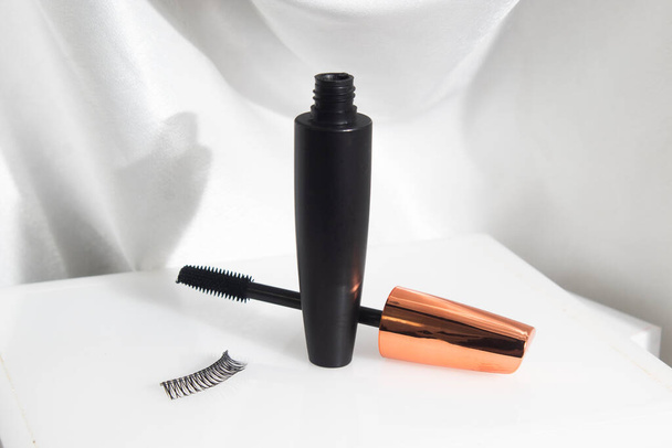 mascara for black lashes, eyelash with bottle container mockup product, cosmetic branding makeup, on white background - Foto, Imagem