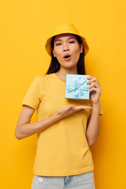 Portrait Asian beautiful young woman blue gift box holiday birthday isolated background unaltered - Foto, Imagem