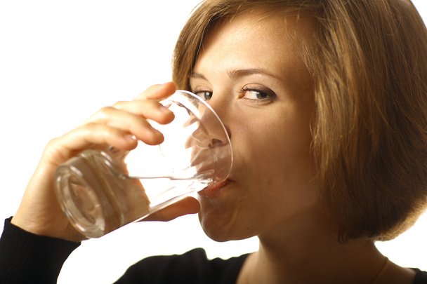Beautiful girl drinking water - Foto, Imagem