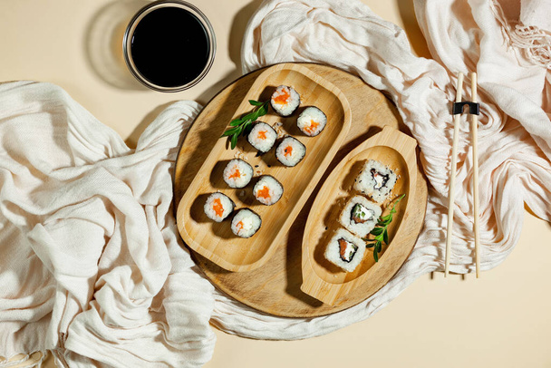 Sushi on a plate on a bright, colored background. - Valokuva, kuva