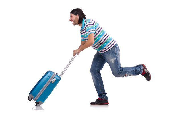 Young man travelling with suitcases isolated on white - Foto, Imagem