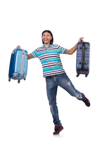 Young man travelling with suitcases isolated on white - Photo, Image