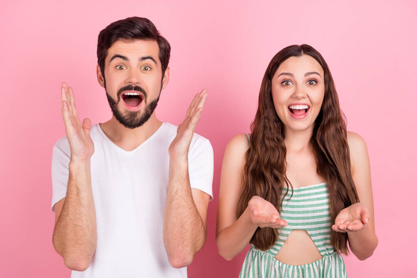 Photo of excited shocked couple wow reaction open mouth wear casual outfit isolated pink color background - Valokuva, kuva