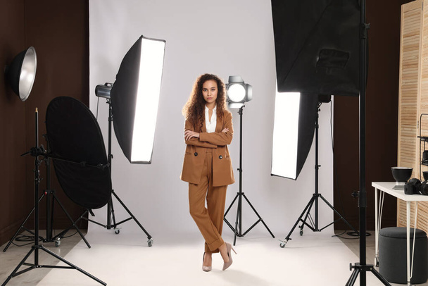 Beautiful African American model posing in studio. Professional photo session - Foto, afbeelding