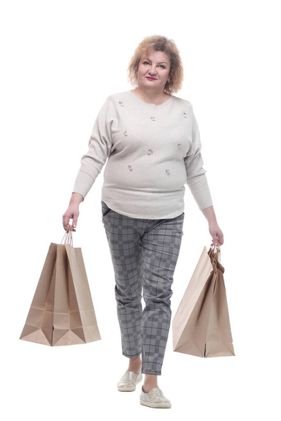 casual adult woman with shopping bags. isolated on a white - Foto, Bild