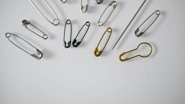 pins and needles of various types in bulk  - Fotó, kép