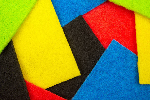 muestras coloreadas de material de fieltro. industria textil industrial. textura de fondo - Foto, imagen