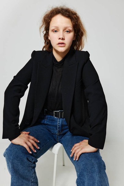 beautiful woman black jacket jeans posing Lifestyle unaltered - Φωτογραφία, εικόνα