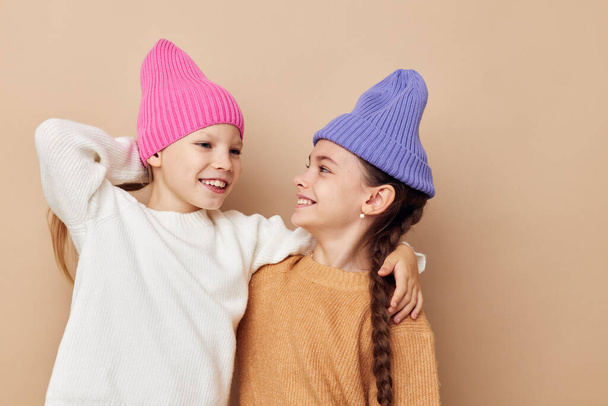 two cute little girls wearing hats fashion childhood - Фото, зображення