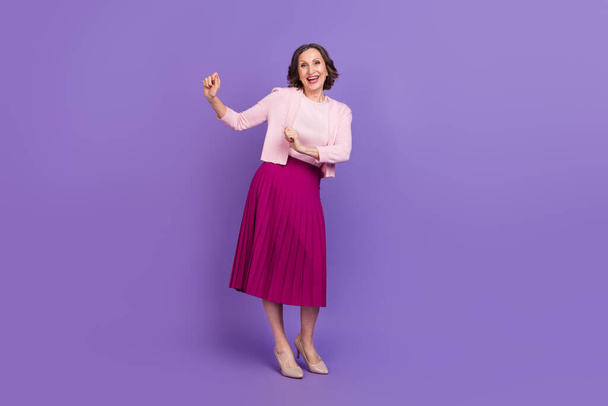 Full length photo of cheerful excited lady enjoy free time weekend clubbing isolated on purple color background - Φωτογραφία, εικόνα