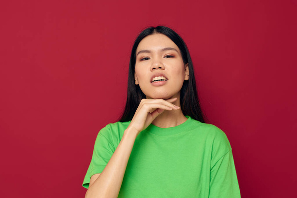 Charming young Asian woman casual wear emotions posing fashion studio model unaltered - Фото, зображення