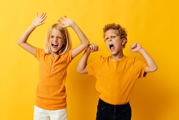 Portrait of cute children casual wear games fun together posing isolated background - Фото, зображення
