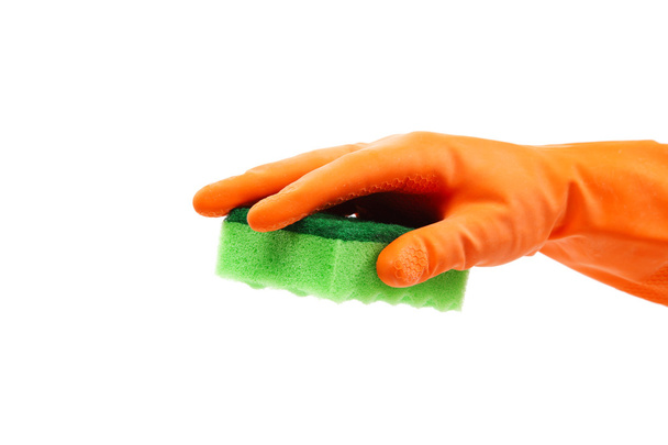 Hand in a rubber glove holding domestic sponge. - Foto, Imagem