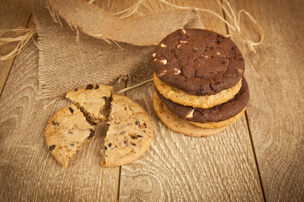 Chocolate cookies on wooden table - Photo, Image