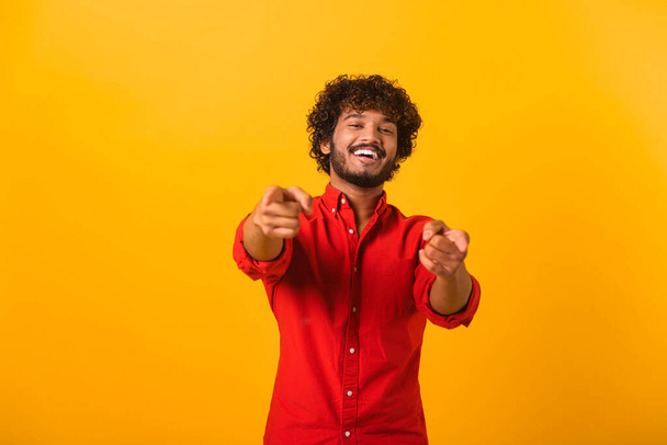 Portrait of cheerful bearded man pointing to camera, smiling, making happy choice, we need you concept. Indoor studio shot isolated - Fotoğraf, Görsel