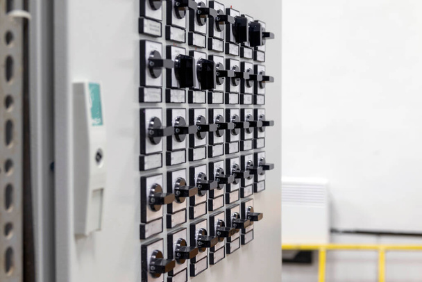 Selective focus. Control and protection board at a power plant control and protection cabinets for substation equipment - Фото, зображення
