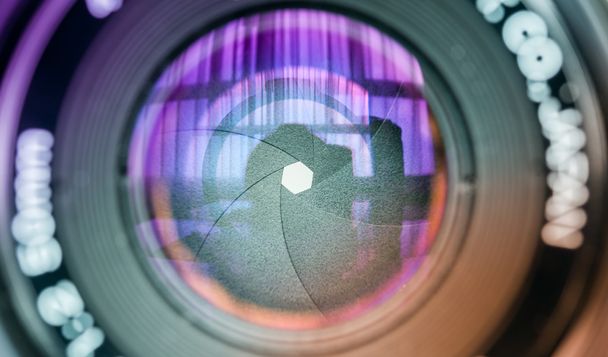 The diaphragm of a camera lens aperture. Selective focus with sh - Photo, Image