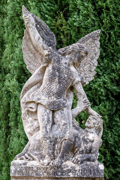 Saint Michael the archangel defeating the devil, cemetery, Santanyi, Mallorca, Balearic Islands, Spain - Photo, Image