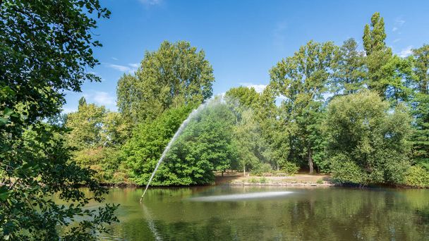 View over the pond of the park in Sterkrade, Oberhausen, North Rhine-Westfalia, Germany - Photo, Image