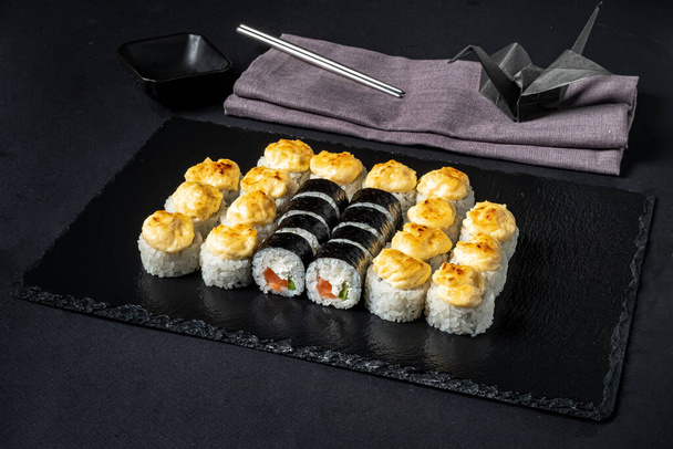 sushi on the black stone - Foto, Imagem