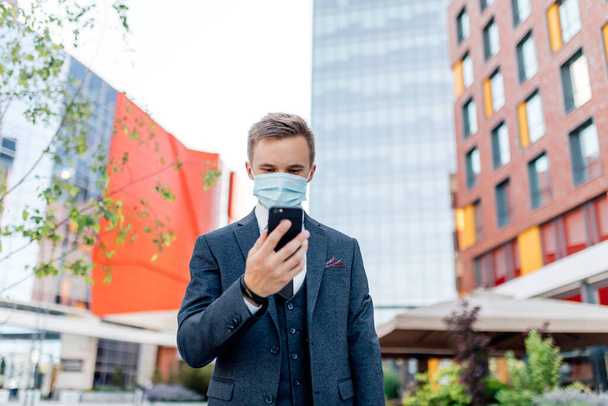 student in formal suit and medical mask - Photo, Image