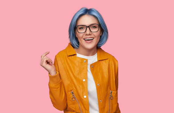 Content woman with blue hair in studio - Photo, Image