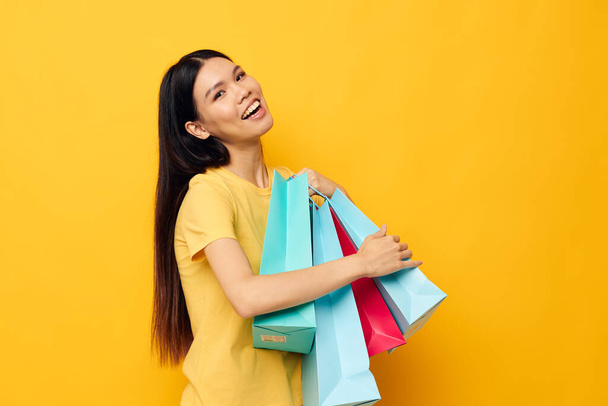 Portrait Asian beautiful young woman woman with packages in hands shopping Lifestyle unaltered - Photo, image