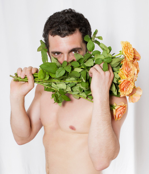 man with roses - Фото, изображение