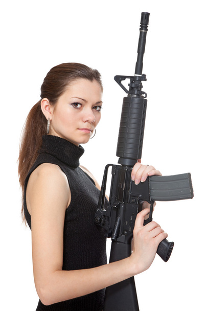 Beautiful girl holding a rifle - Zdjęcie, obraz