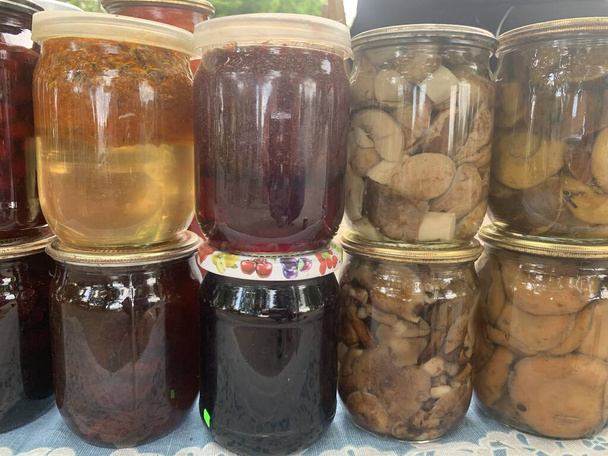 Homemade preparations for the winter. Pickled peppers, tomatoes, cucumbers, cabbage, etc. - Photo, Image