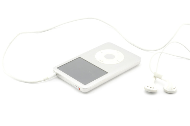 mp3 player with earphone isolated on white - 写真・画像