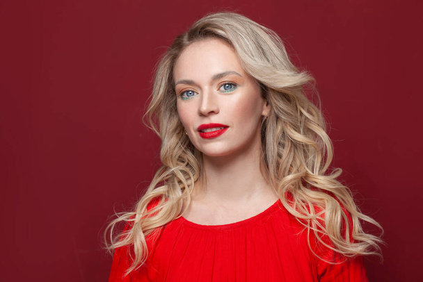 Perfect gorgeous fashion model woman with blonde curly hairdo and red lips makeup - Photo, image