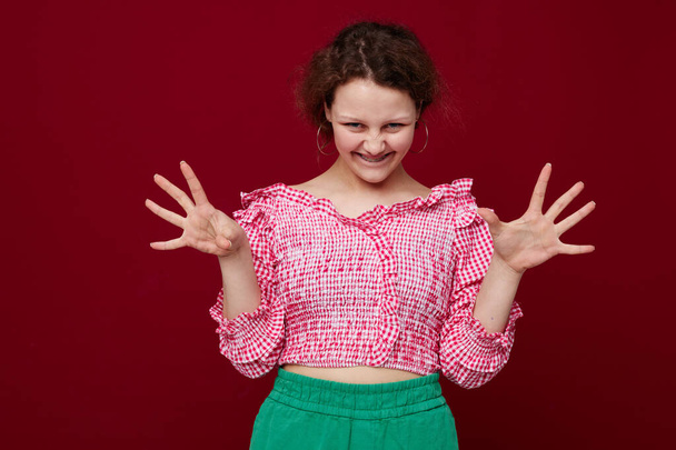 cheerful woman pink shirt posing hand gesture - Φωτογραφία, εικόνα