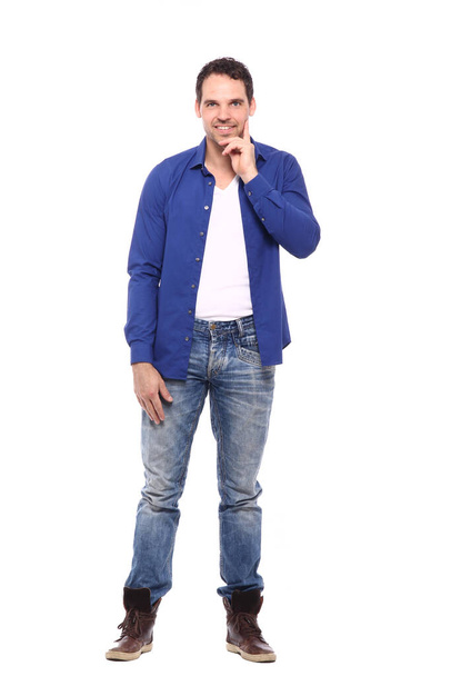 Man standing in front of a white background - Foto, Imagen