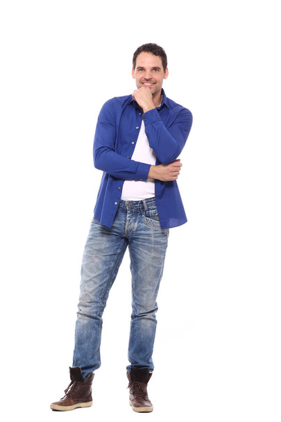Man standing in front of a white background - Foto, afbeelding