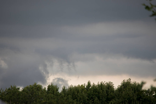 Black clouds in the sky before the rain - Fotó, kép
