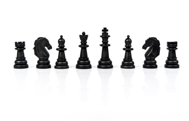 schaken stukken geïsoleerd op witte achtergrond - Foto, afbeelding