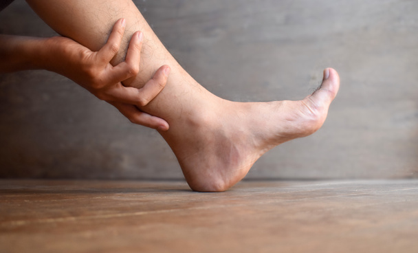 Leg of Asian young man. Concept of leg pain or problem. - Φωτογραφία, εικόνα